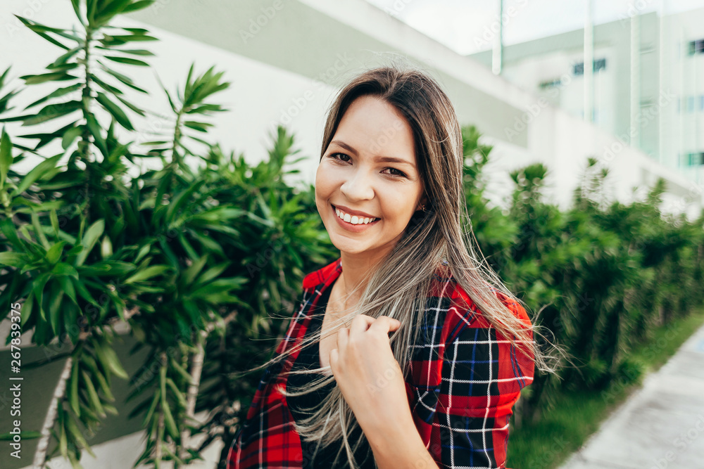 Portrait of beautiful young woman in the city Portrait of beautiful young woman in the city