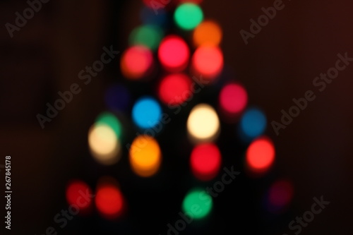 Christmas bokeh from lights in a chrsitmas tree