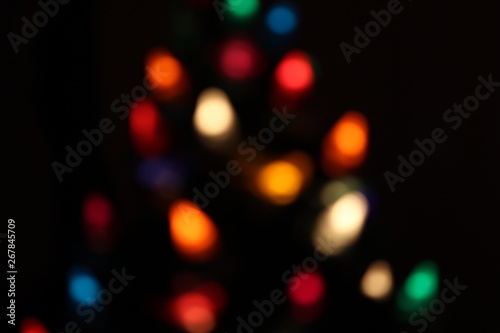 Christmas bokeh from lights in a chrsitmas tree © dbriyul