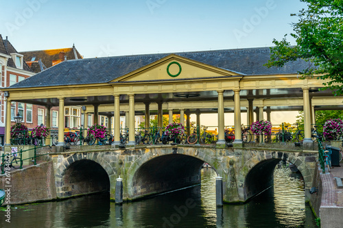 Sunset view of Koornbrug bridge in Leiden, Netherlands photo