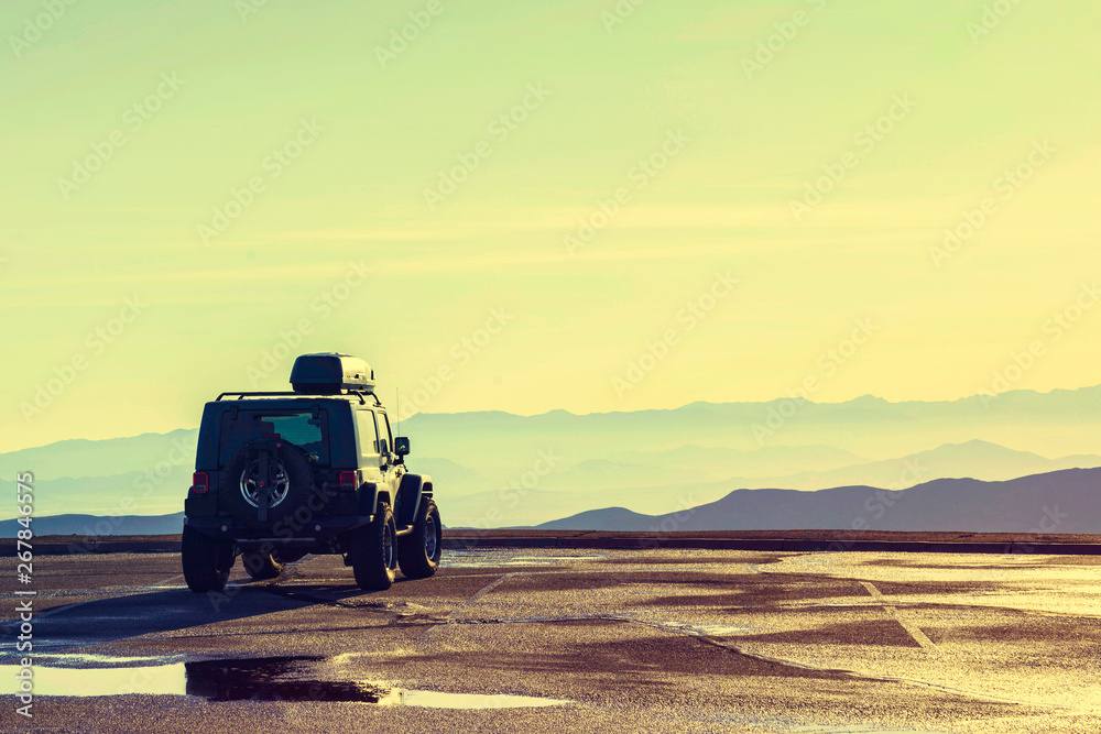 Fototapeta premium Vehicle adventure car on the top mountain