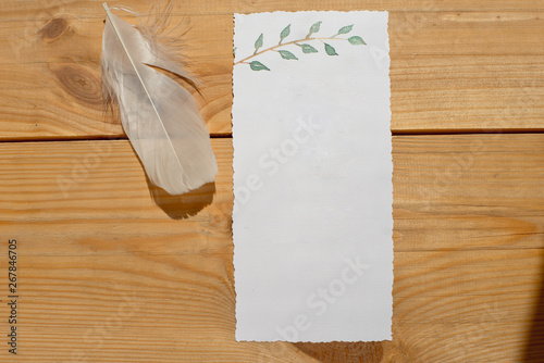 Wedding invitation as a decorated letter in an envelope in the style of boho