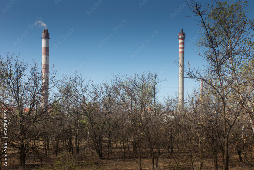 Obraz premium High chimneys of zinc and lead foundry