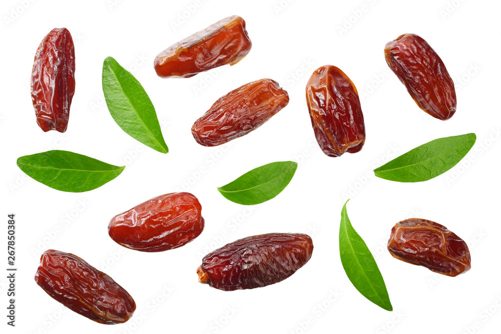 date fruits with green leaves isolated on white background. top view date fruits with green leaves isolated on white background. top view