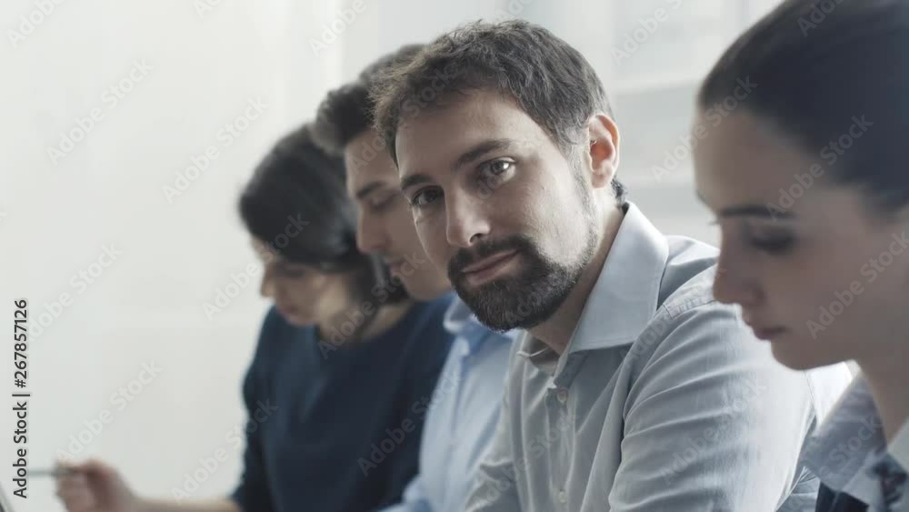 Efficient business team working at office desk Efficient business team working at office desk