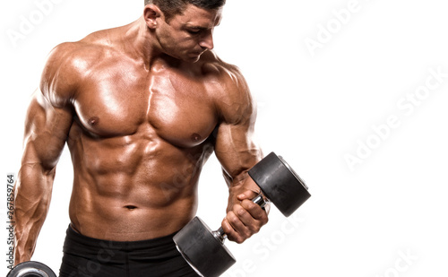 Handsome Bodybuilder Lifting Weights. Execising With Dumbbells, Performing Dumbbell Biceps Curls © mrbigphoto