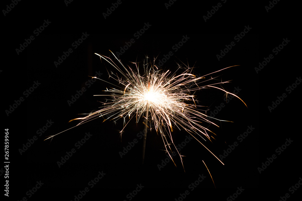 Sparkler candle at summer night holiday party