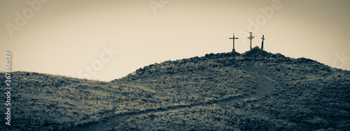 Three crosses on a hill
