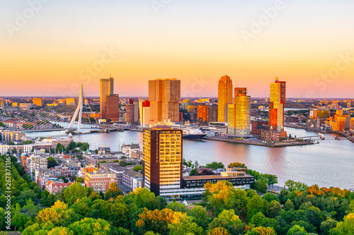 Sunset aerial view of Erasmus bridge and skyline of Rotterdam, Netherlands