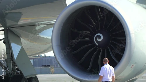 Wallpaper Mural Airport. Aircraft airman pilot inspecting jet turbine engine blades on runway. employee supervisor maintenance checking aircraft airplane. departure quality control flight safety. aviation security Torontodigital.ca