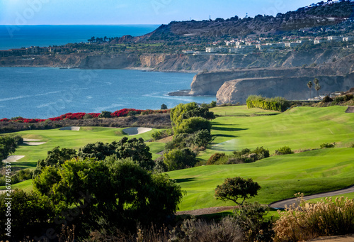 The Trump National Golf Course, in Rancho Palos Verdes along the Pacific coast of California, opened in 2006. Fairway and greens with lakes, sand traps are seen, ocean background with cliffs, bluffs.