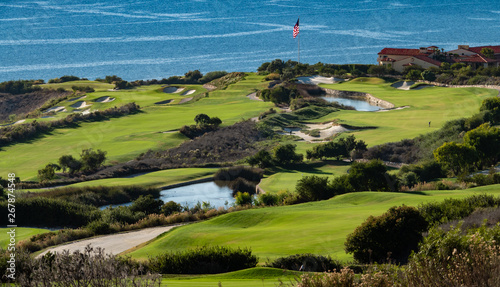 The Trump National Golf Course, in Rancho Palos Verdes along the Pacific coast of California, opened in 2006. Fairway and greens with lakes, sand traps are seen, ocean background with cliffs, bluffs.