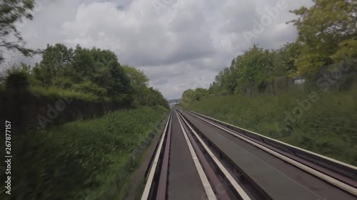 View from the front of the wagon of an automated shuttle rolling in the countryside near Paris
