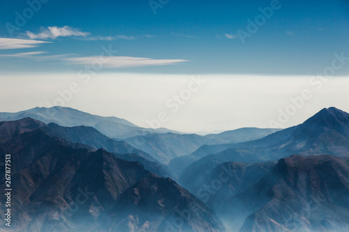 Fototapeta Naklejka Na Ścianę i Meble -  Aerial View of a California Mountain Wildfire Smoke from Above