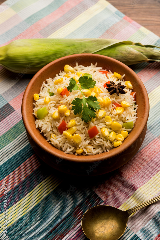 Corn Pilaf or Pulav made using boiled Maize seeds with rice and vegetables. selective focus