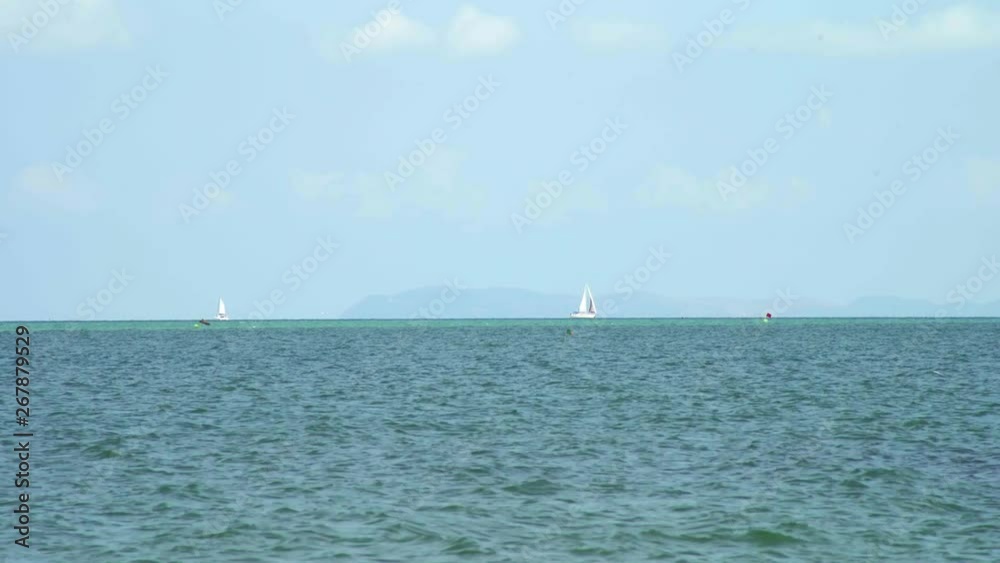Yacht on the sea horizon in a beautiful blue sea on a summer day. Thailand. Yacht on the sea horizon in a beautiful blue sea on a summer day. Thailand.