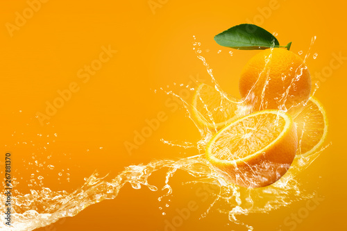 Fresh Sliced ​​oranges and Orange fruit on Orange background