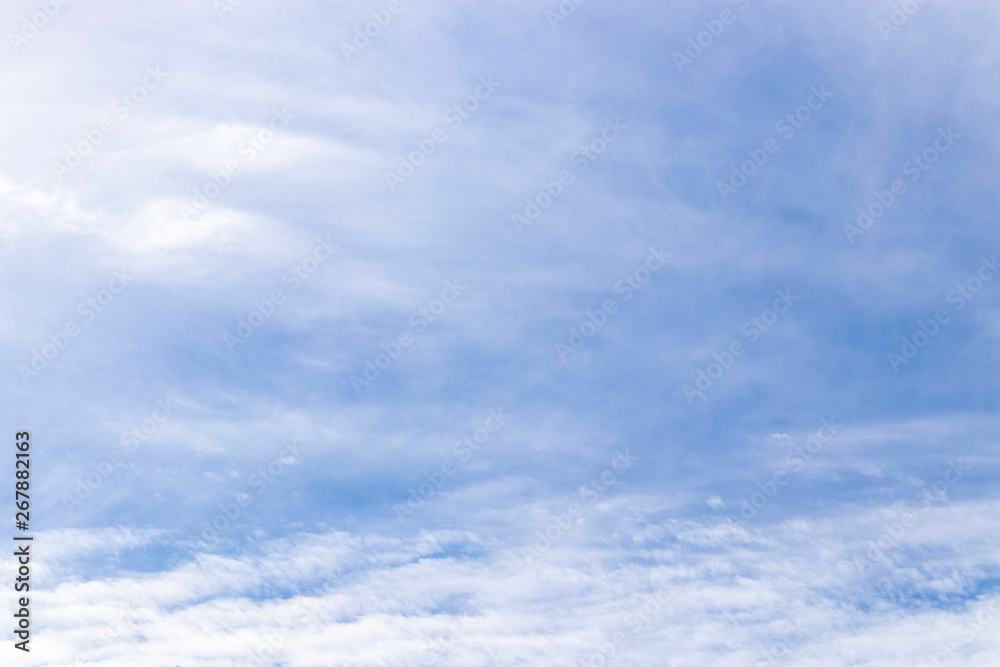 White clouds on a blue sky.