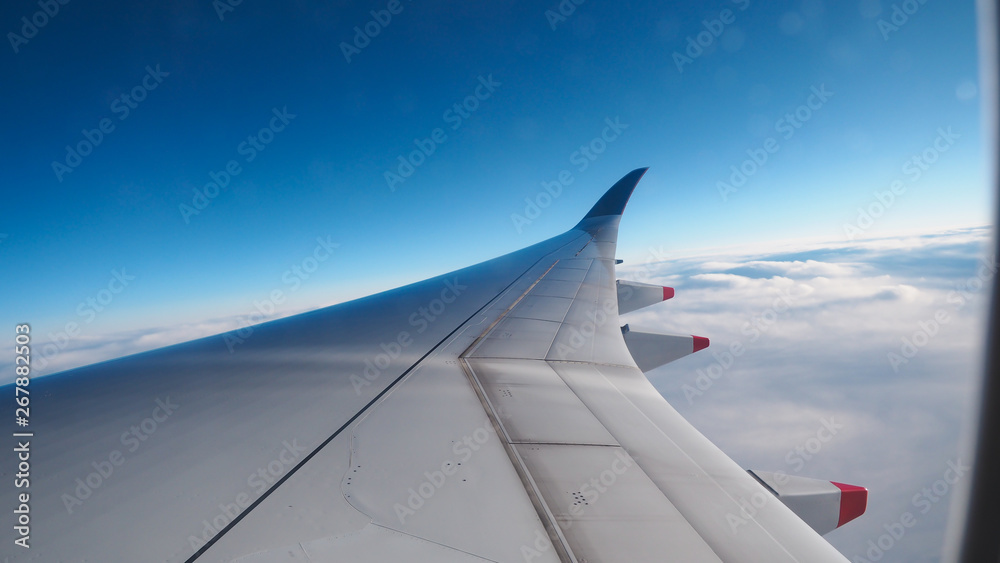 Fototapeta premium Plane wings and views Take pictures in the plane