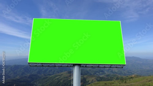 Advertising billboard green screen with blue sky and white cloud, timelapse