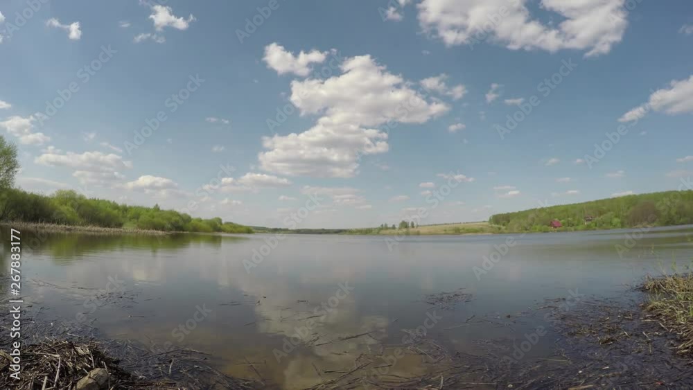 Beautiful wide lake and big cloudy sky on the sunny day Beautiful wide lake and big cloudy sky on the sunny day