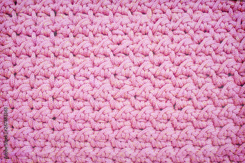Pink crochet knitted seamless patterns texture for background
