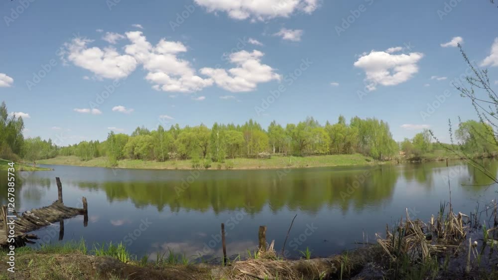 Beautiful wide lake and big cloudy sky on the sunny day Beautiful wide lake and big cloudy sky on the sunny day