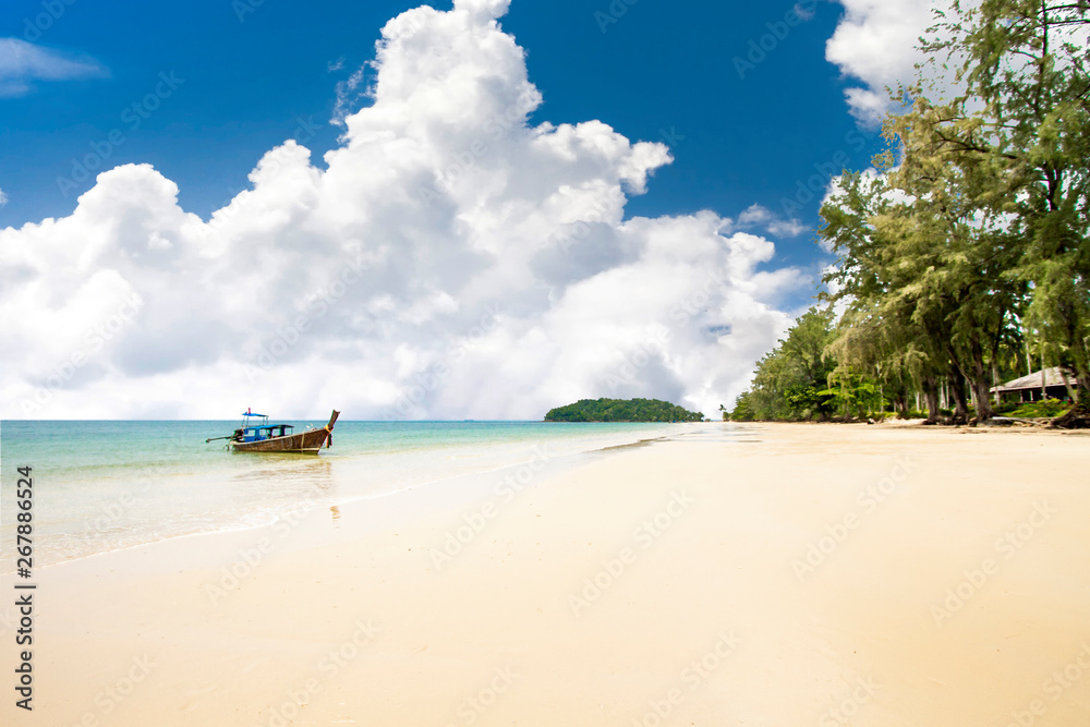 Fototapeta premium Beauty beach with yellow sand and crystal clear water in Krabi Thailand