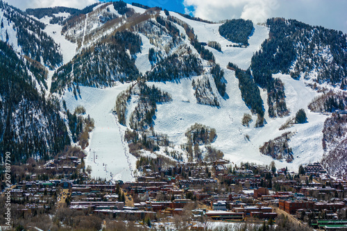 Downtown Aspen, Colorado in the Winter During the Day with the Mountains in the Background photo