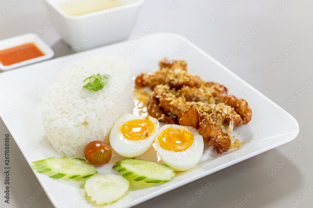 Fried Chicken with Garlic Pepper and boiled egg on Rice Fried Chicken with Garlic Pepper and boiled egg on Rice