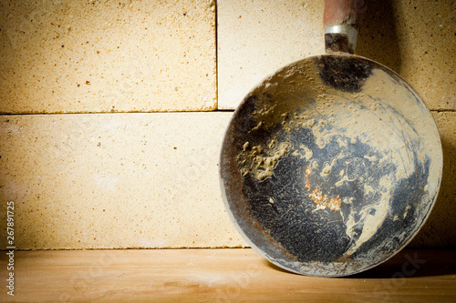 Fotografie Ladle mortar and refractory bricks