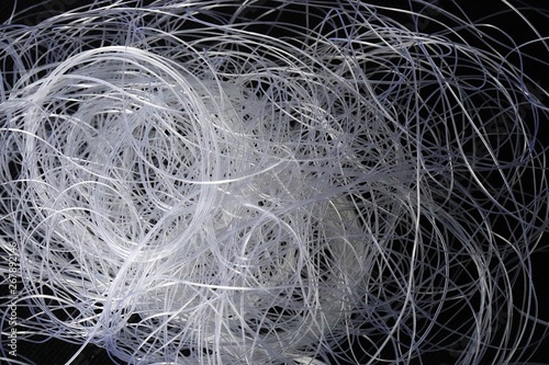 Fototapeta Naklejka Na Ścianę i Meble -  Close up of nylon thread on black background