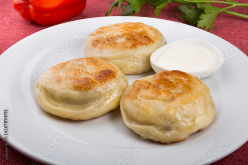 Fried buns stuffed with meat