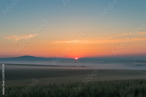 Landscape with sunrise over the hills © irena iris szewczyk