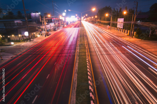 Speed Traffic - light trails on  The city road to Town Phuket Thailand  highway at night, long exposure abstract  background
