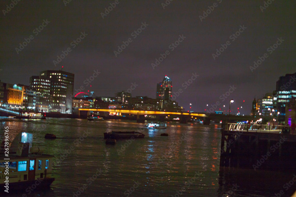 London river thames at night with glowing water