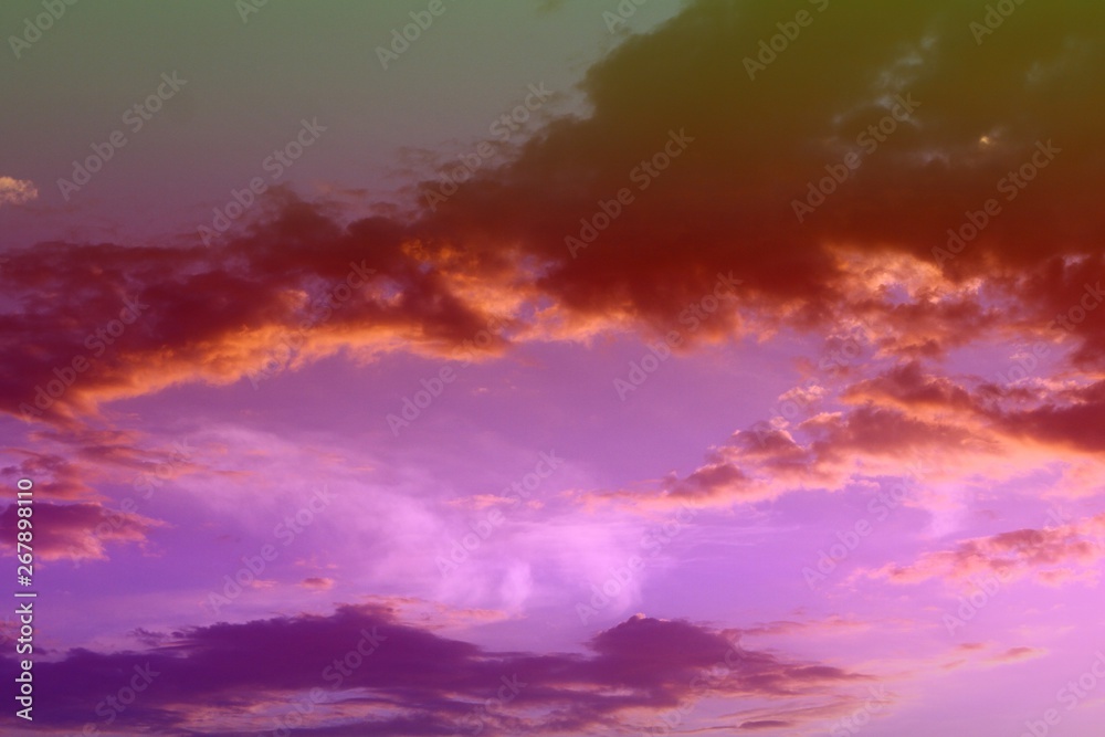 amazing colorful sun colored clouds in the sky for using in design as background.
