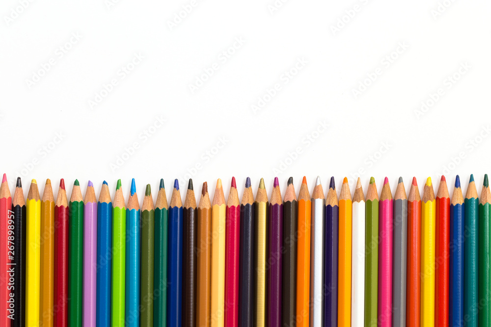 Colour pencils isolated on white background. Back to school concept Wood texture pencil with sharpening shavings on white background pencil on table, the blogger instrument. copyspace, space for text. Colour pencils isolated on white background. Back to school concept Wood texture pencil with sharpening shavings on white background pencil on table, the blogger instrument. copyspace, space for text.
