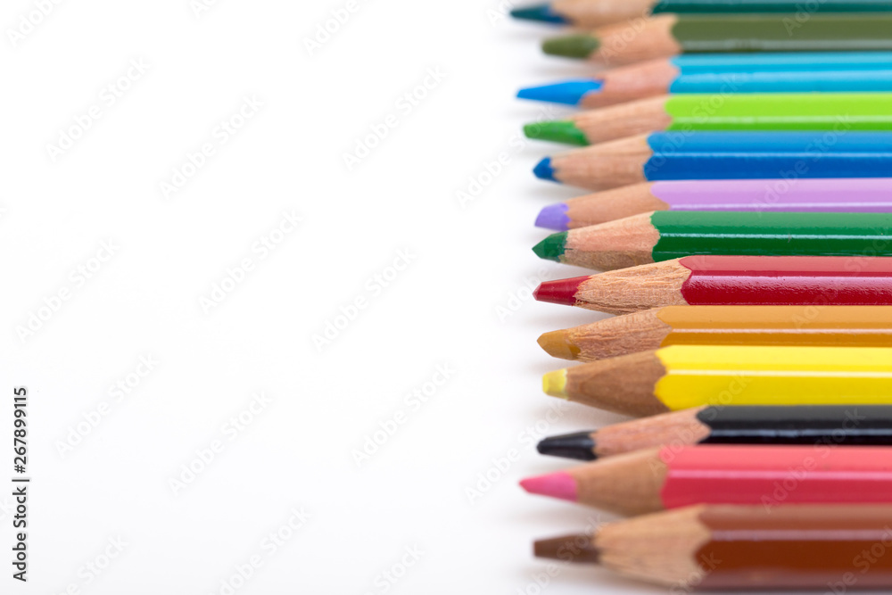 Colour pencils isolated on white background. Back to school concept Wood texture pencil with sharpening shavings on white background pencil on table, the blogger instrument. copyspace, space for text. Colour pencils isolated on white background. Back to school concept Wood texture pencil with sharpening shavings on white background pencil on table, the blogger instrument. copyspace, space for text.