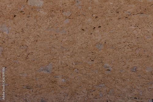 surface or wall with small stones and concrete for background