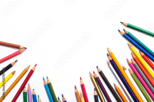 Colour pencils isolated on white background. Back to school concept Wood texture pencil with sharpening shavings on white background pencil on table, the blogger instrument. copyspace, space for text.