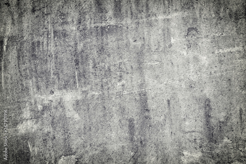 Gray abstract background with scratches and irregularities. Old worn slate sheet. The basis for the layout.