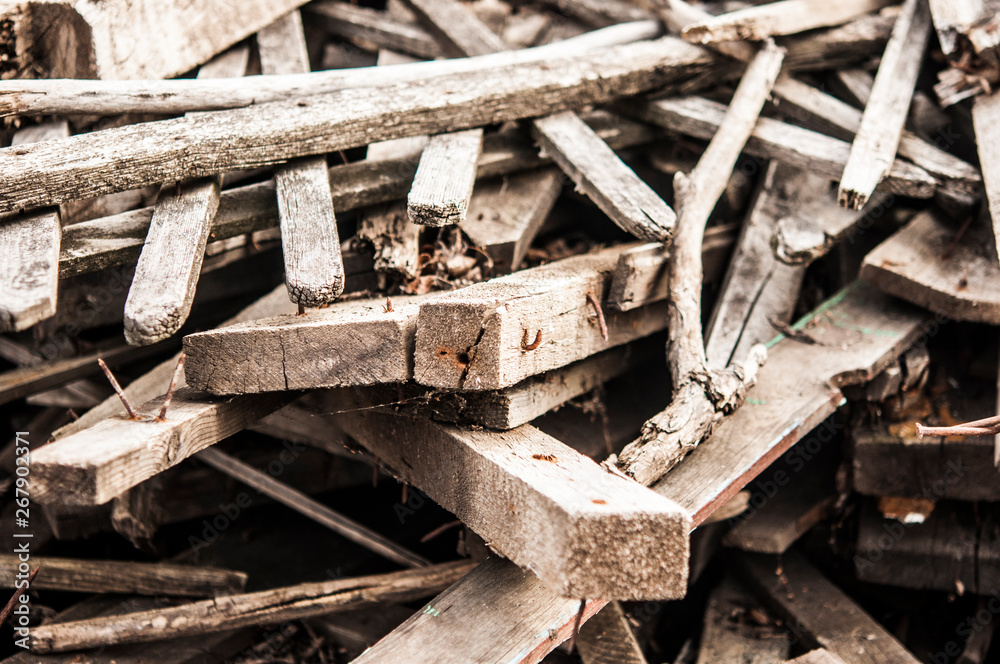 Pile of wood with nails