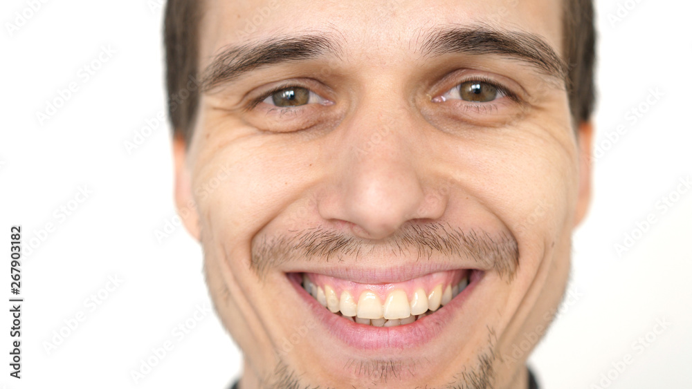 Face of young attractive successful smiling man on a white background Face of young attractive successful smiling man on a white background