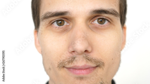 Face of young attractive man on a white background