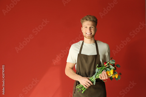 Handsome florist on color b...