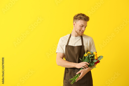 Handsome florist on color b...