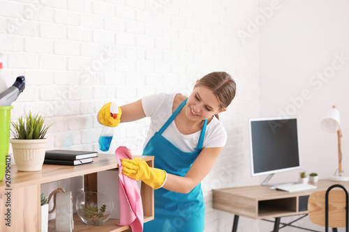 Female janitor cleaning flat