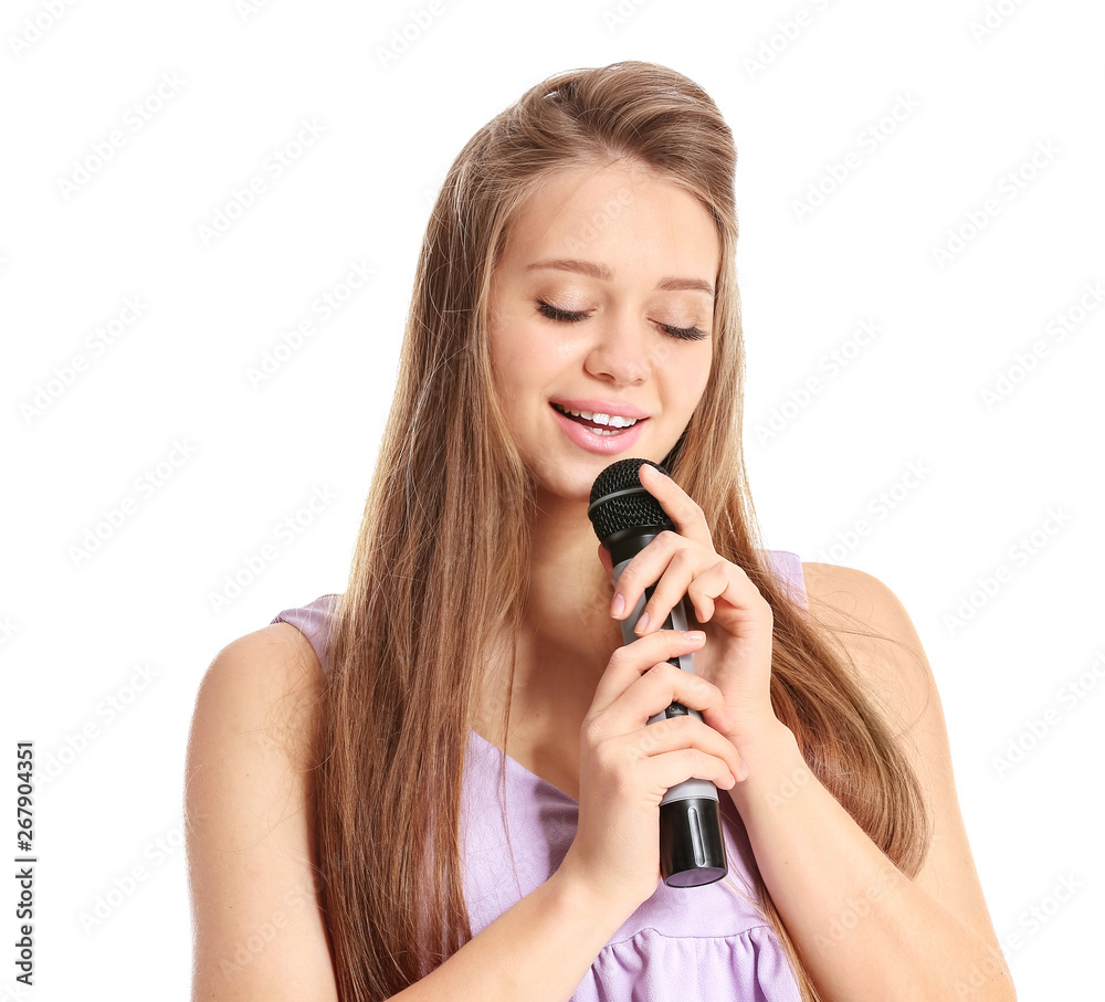 Beautiful female singer with microphone on white background Beautiful female singer with microphone on white background