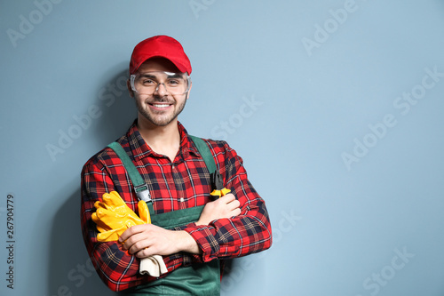 Male electrician on color b...